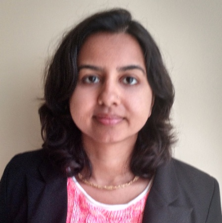 Samita Sarkar, freelance writer and editor, photographed in a dark jacket